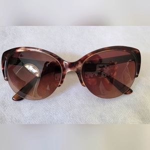 Cat-eye tortoise sunglasses.